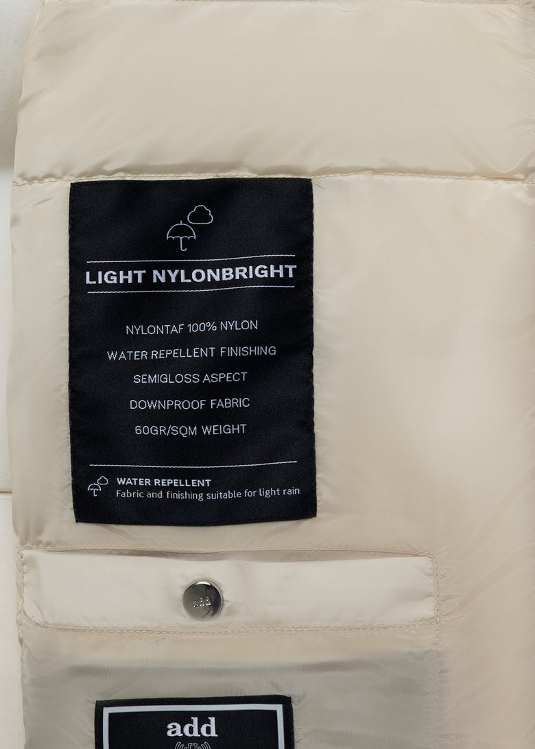 padded bomber with knitted sleeves and details