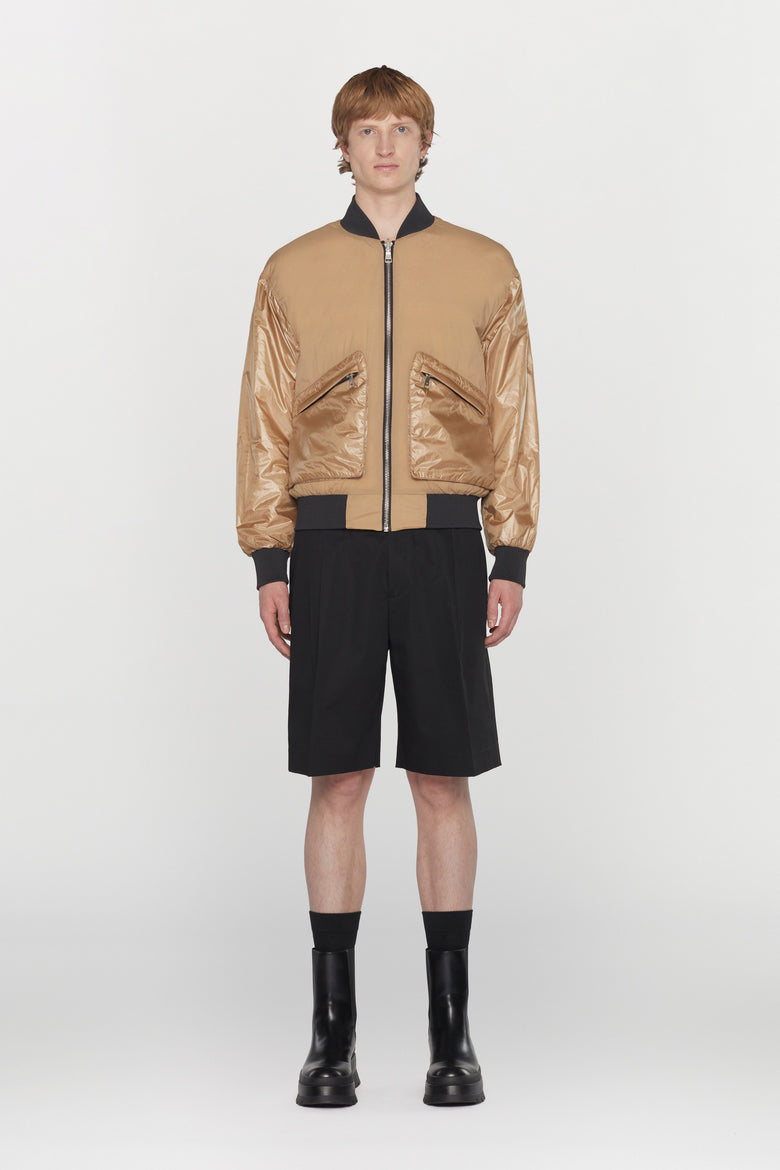Reversible bomber jacket in water- repellent technical fabric with ribbed details