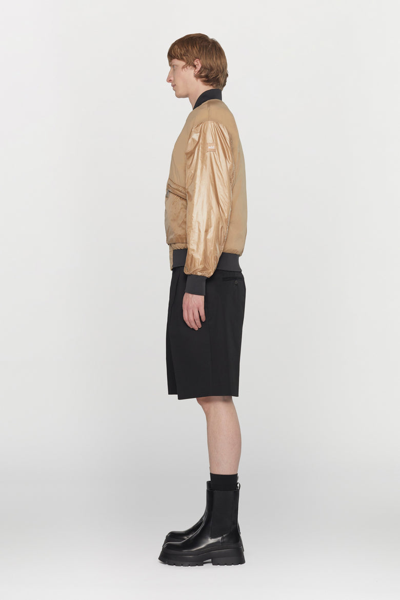 Reversible bomber jacket in water- repellent technical fabric with ribbed details