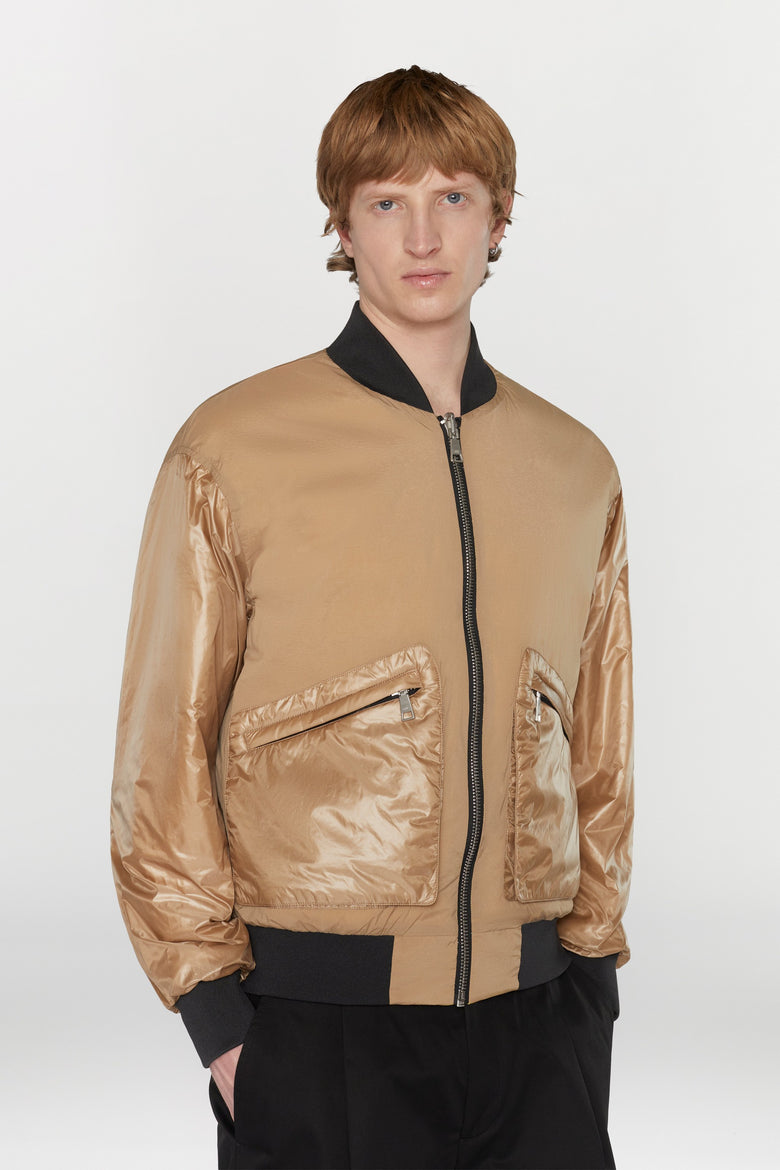 Reversible bomber jacket in water- repellent technical fabric with ribbed details