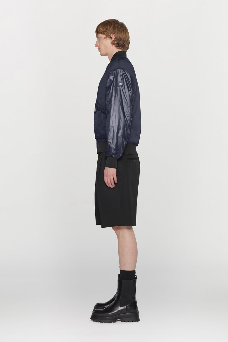 Bomber reversibile in tessuto tecnico idrorepellente con dettagli a costine