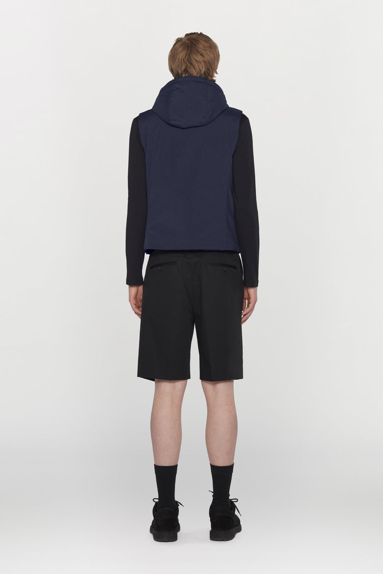 Water-repellent padded technical fabric waistcoat with removable hood